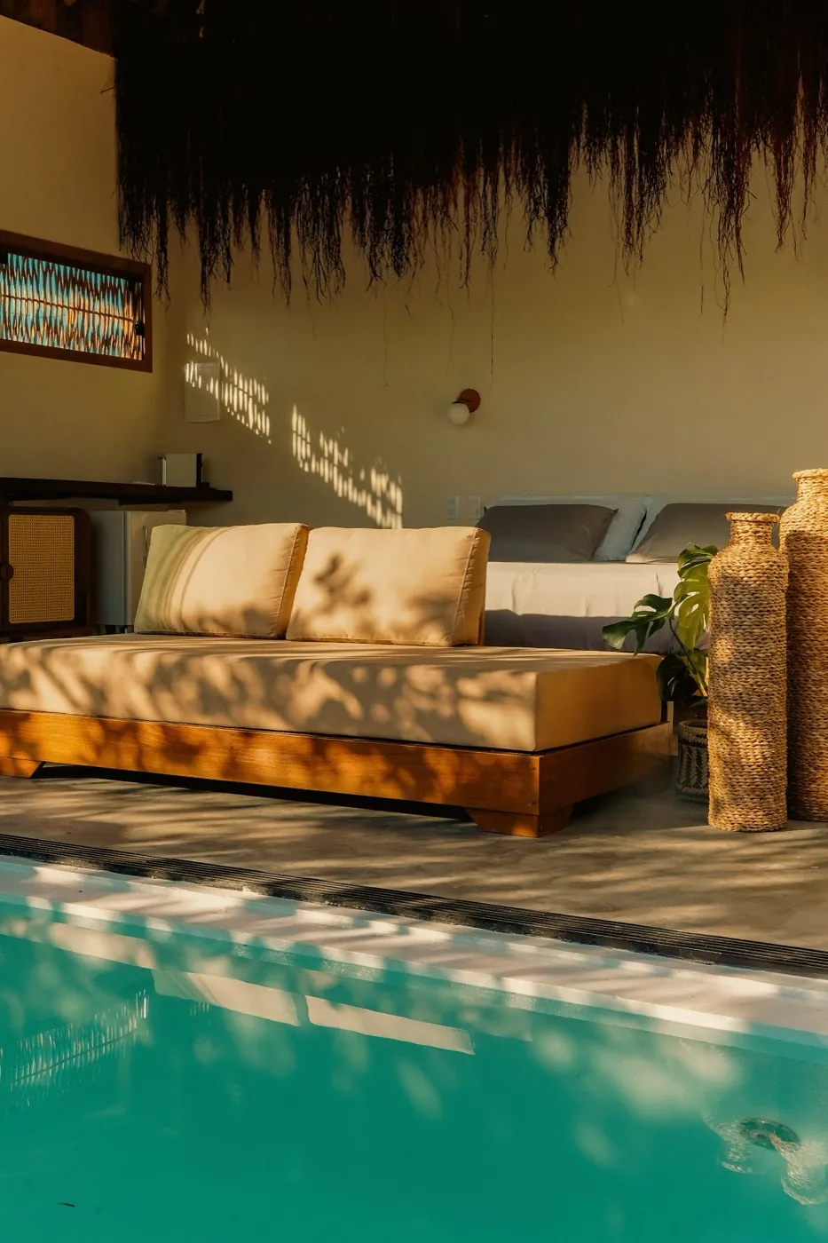 Private Chalet: living room by the pool at dusk
